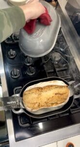 Removing the lid to continue baking uncovered