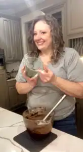 Adding chocolate chips to brownies