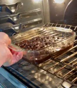 putting brownies in the oven